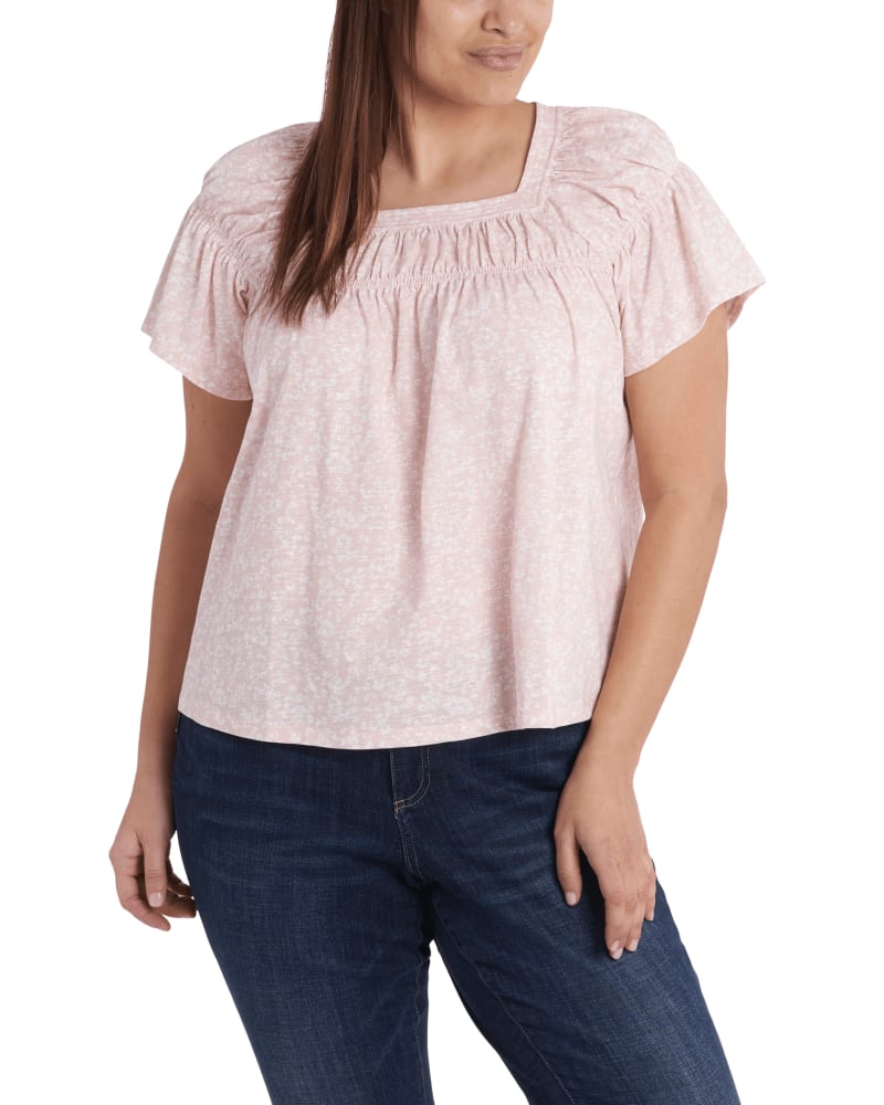 Front of a model wearing a size 1X Martha Smocked Top in 640-KITTEN PINK by CeCe. | dia_product_style_image_id:263570